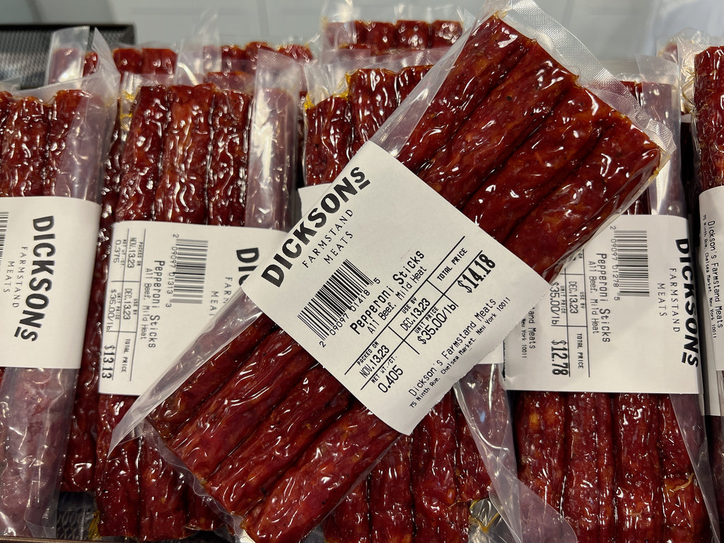 Packages of dried sausage sticks with labels