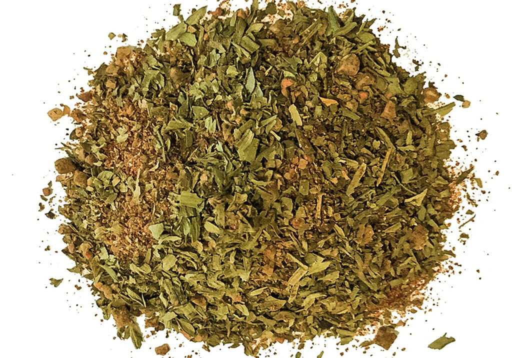 A pile of dried green herbs, finely chopped.